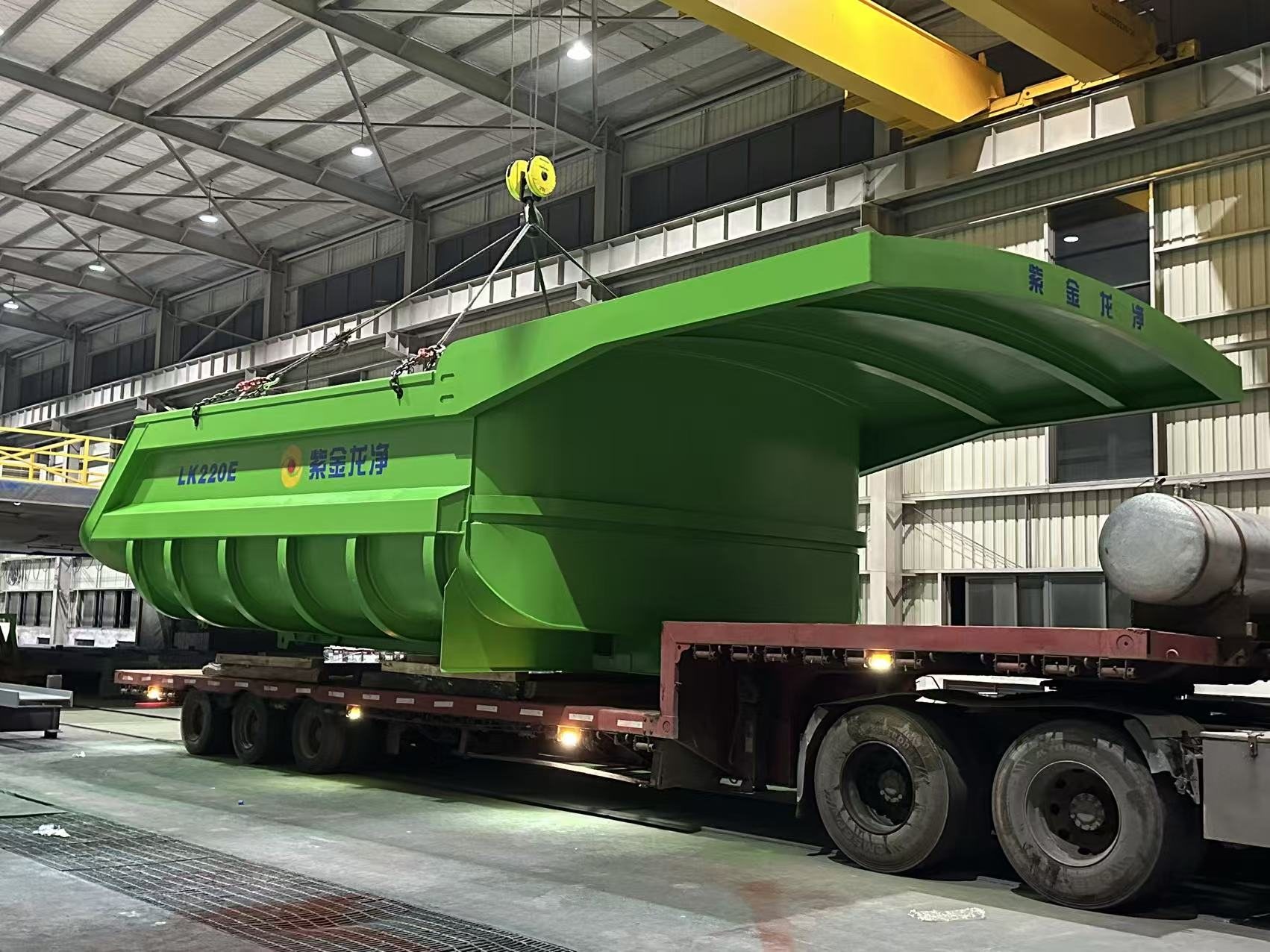 Large fabricated steel component loaded for delivery
